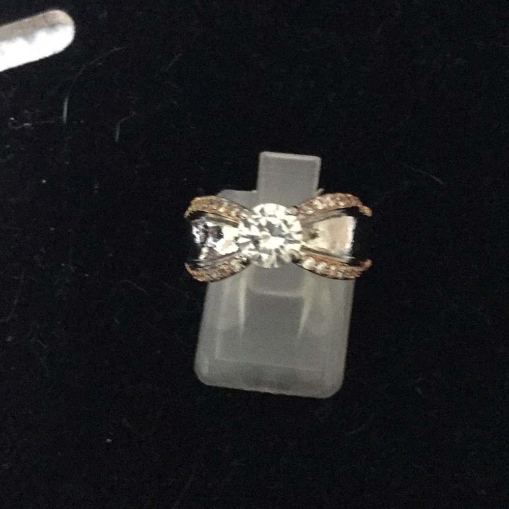 Sterling silver with rose gold and white sapphire